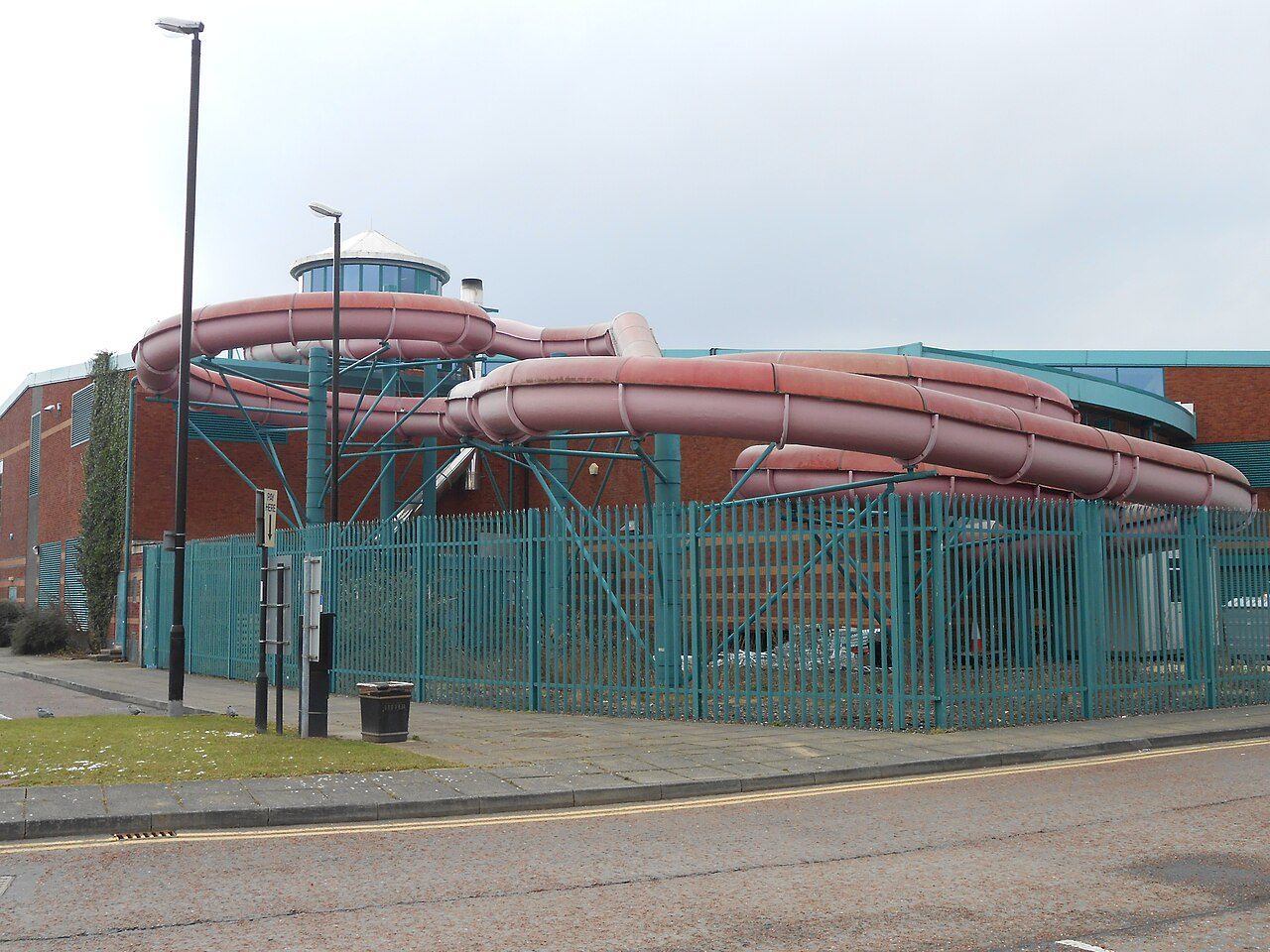 The outside of Europa Pools, Birkenhead, with its pink water flume