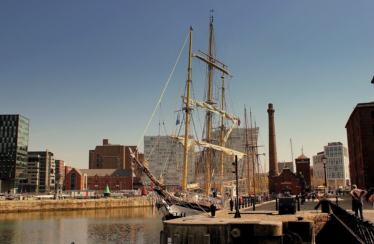 The Maritime Museum at the Royal Albert Dock with a tall ship moored outside