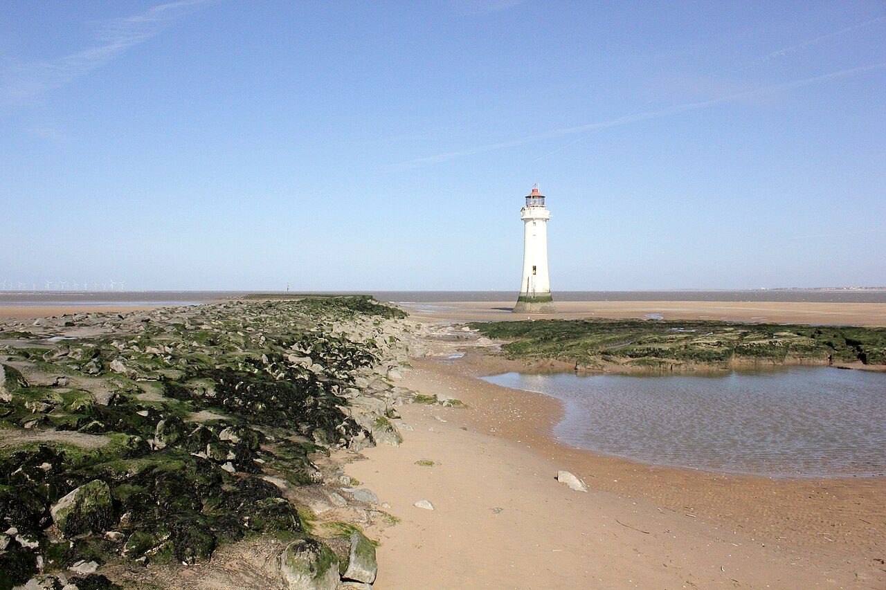 New Brighton beach with Perch Rock lighthouse at low tide