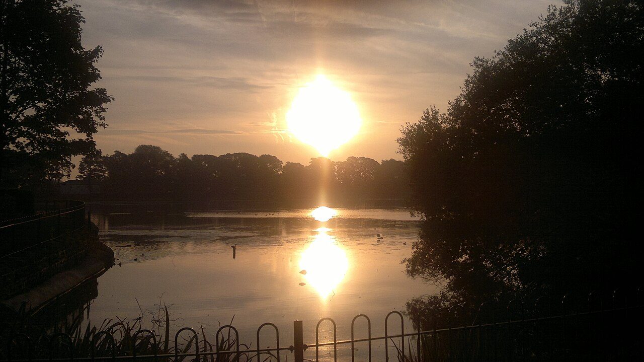 Sunrise over the lake at Taylor Park, St Helens