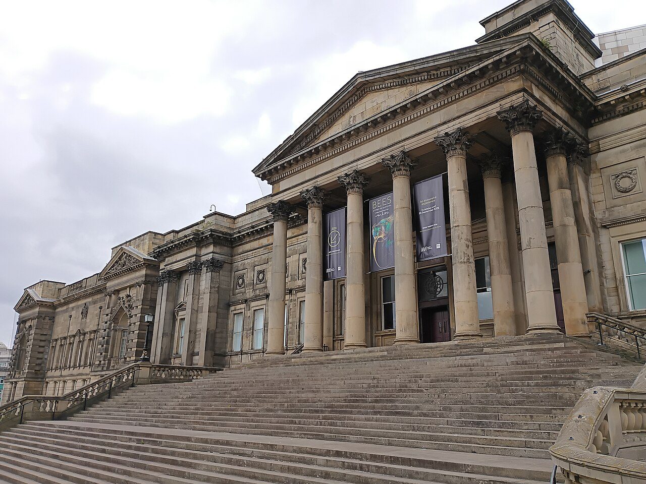 The columned front and steps of World Museum on William Brown Street