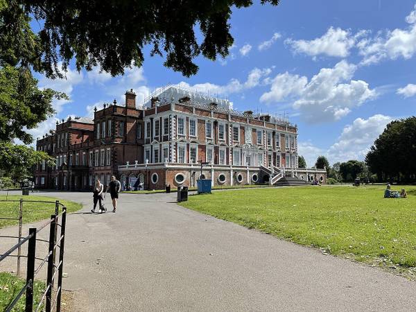 Croxteth Hall seen across the lawn on a sunny day