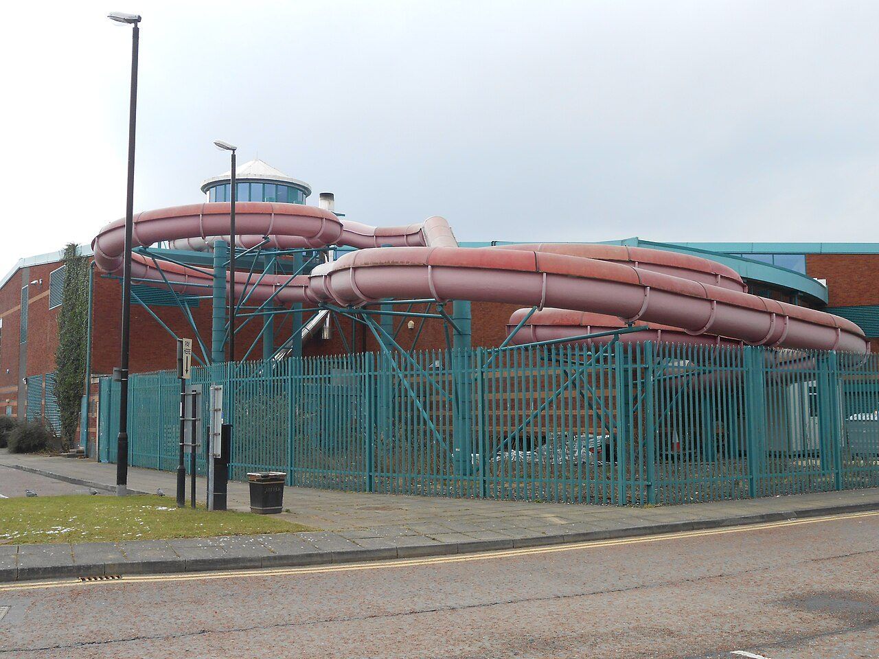 The outside of Europa Pools, Birkenhead, with its pink water flume