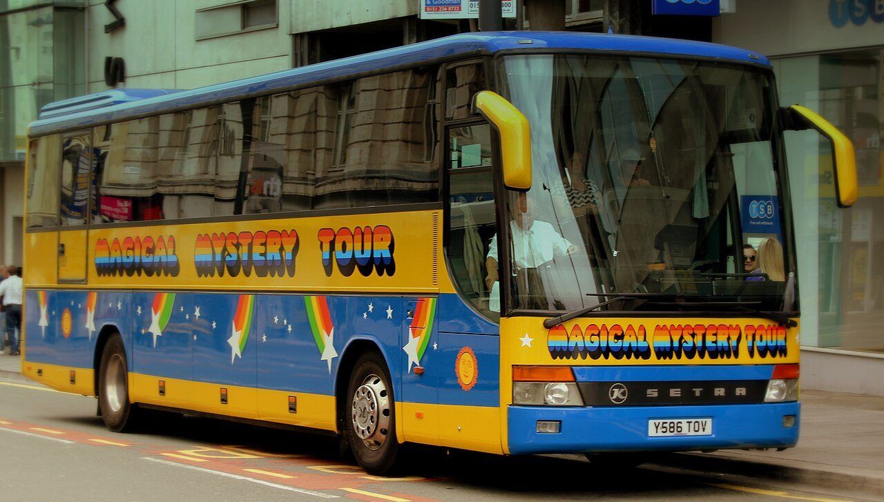 The yellow and blue Magical Mystery Tour coach in Liverpool city centre