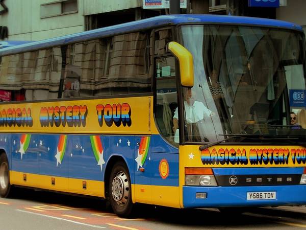 The yellow and blue Magical Mystery Tour coach in Liverpool city centre